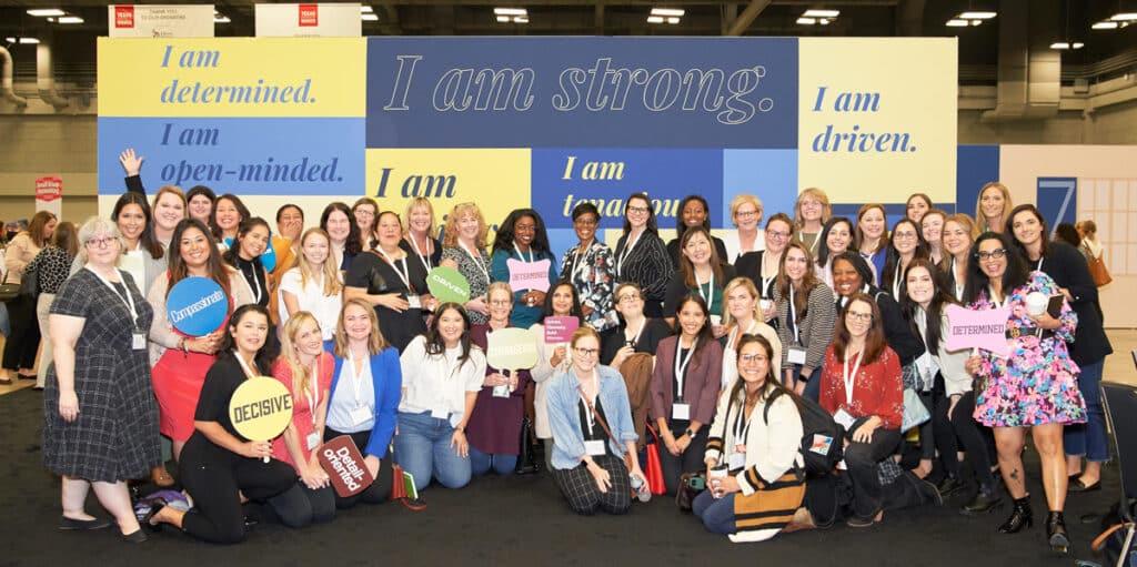 attendees posing for a group photo at the TX Conference for Women